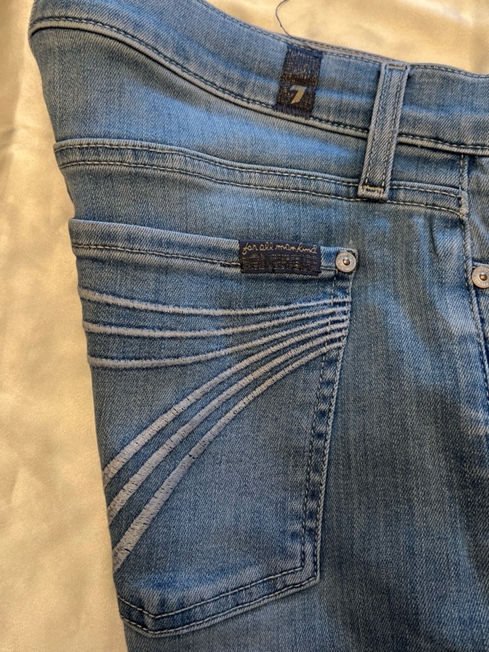 7 For All Mankind Women’s Light Blue Bootcut Jeans with Curved Pocket Stitching